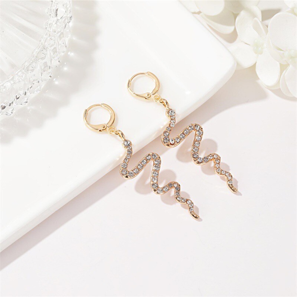 Trendy gold rhinestone snake drop earrings
